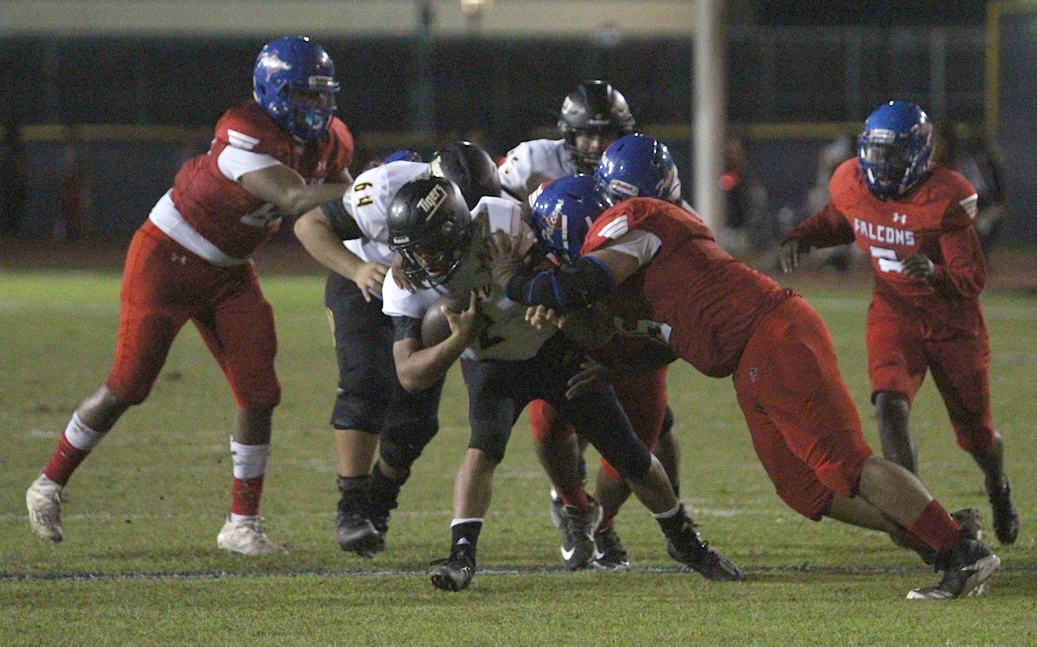 Royal junior lineman Elvis Calderon takes down Sealy sophomore quarterback D’vonne Hmielewski in the first half of the teams’ first district game on Oct. 9, 2020 at Falcon Stadium in Brookshire.